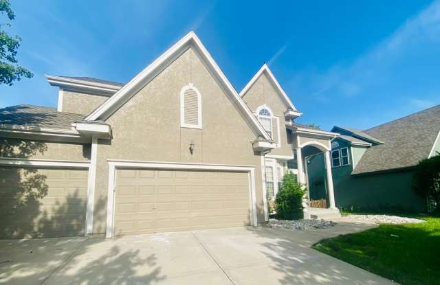 {15808} Hampton Place Two Story Home + Finished Basement + Three Car Garage + Blue Valley HS