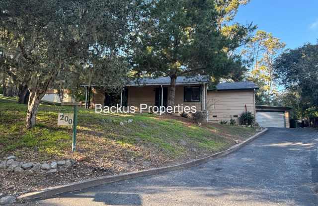 Wonderful one level home surrounded by trees
