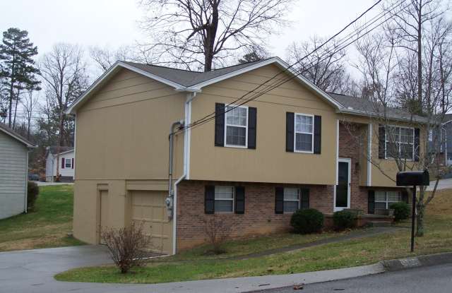 3 bed, 1.5 bath, 1 car garage split foyer with great yard