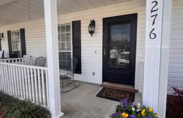 Conveniently located close to shopping, schools, etc.
