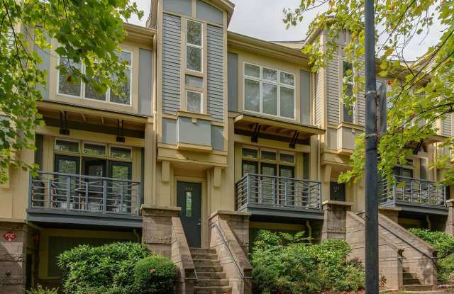 Stunning condo in Uptown's popular and pedestrian friendly First Ward with a roof top patio!