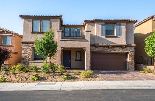 A stunning 4 Bedroom home nestled in the prestigious community in Henderson!