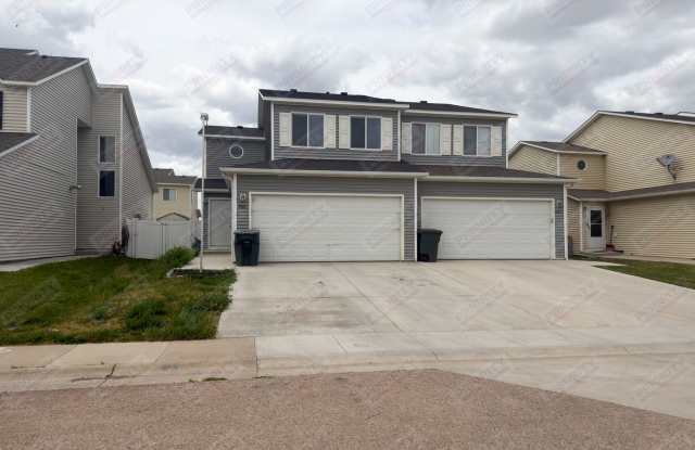 3 bed, 2.5 bath townhouse with a 2 car garage