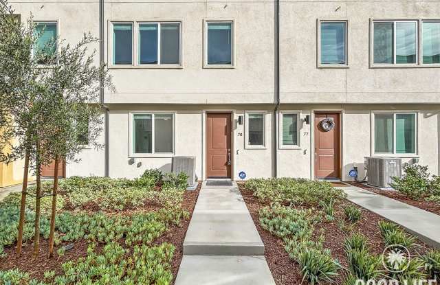 Photo of Beautiful 3BD/2.5BA Townhouse in San Ysidro W/ W/D, A/C, 2-Car Garage, Balcony, and Community Parks!