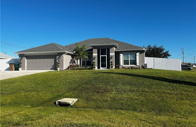 605 NW 18th Place - 605 Northwest 18th Place, Cape Coral, FL 33993