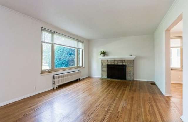 Spacious 2 Bedroom on Quiet Street featuring Central Air, Fireplace, Dishwasher, Private Screened Patio and More