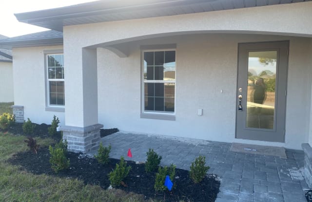 2614 NW 25th PL - 2614 Northwest 25th Place, Cape Coral, FL 33993