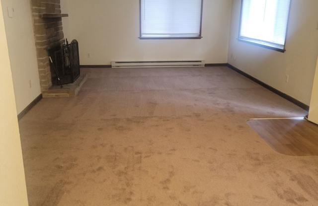 University Place 4 bedroom, 2 bath. Partially fenced yard