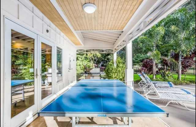 Furnished home on Palma Sola Bay with dock and pool