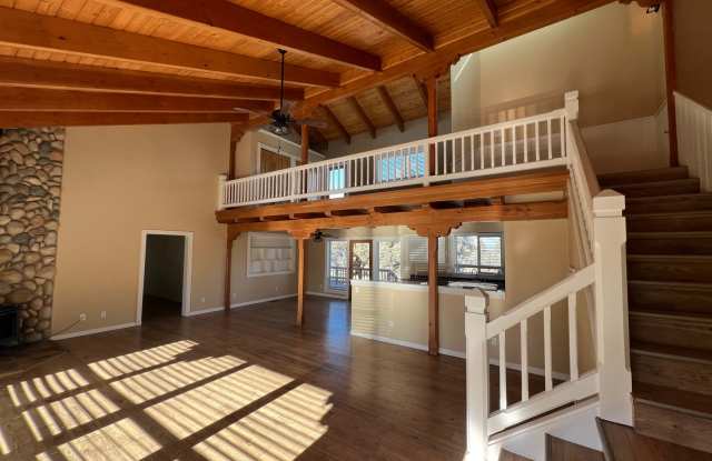 Photo of Beautiful Unique 4 Bedroom home with a loft  3 full bathrooms! Move In Special $500 off first months rent