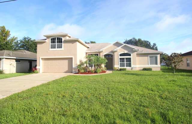 Huge 4 Bed 3 Bath Home w FENCED YARD and SCREENED LANAI for Rent!