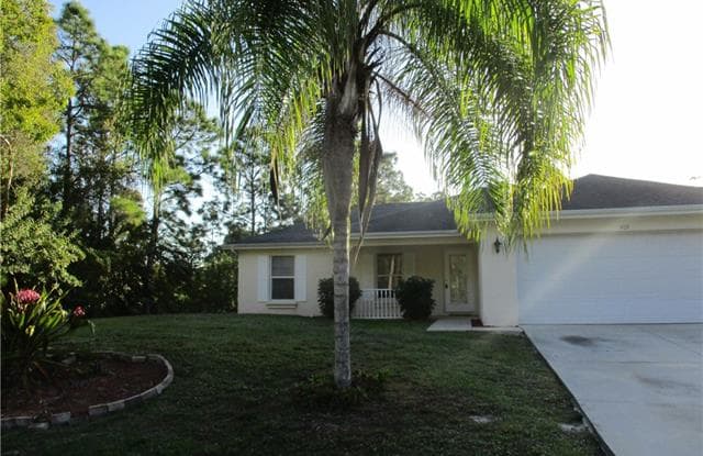 709 Bennington DR - 709 Bennington Drive, Lehigh Acres, FL 33974