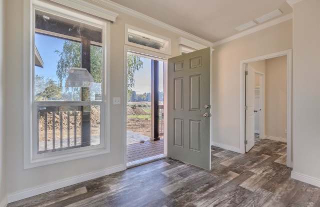 New Single Level Home situated on an active Hazelnut Orchard