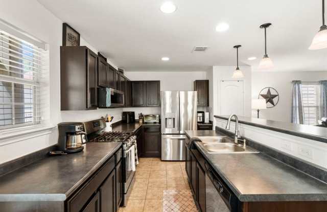 Welcome to this beautifully maintained home in Kyle’s sought-after Plum Creek community!