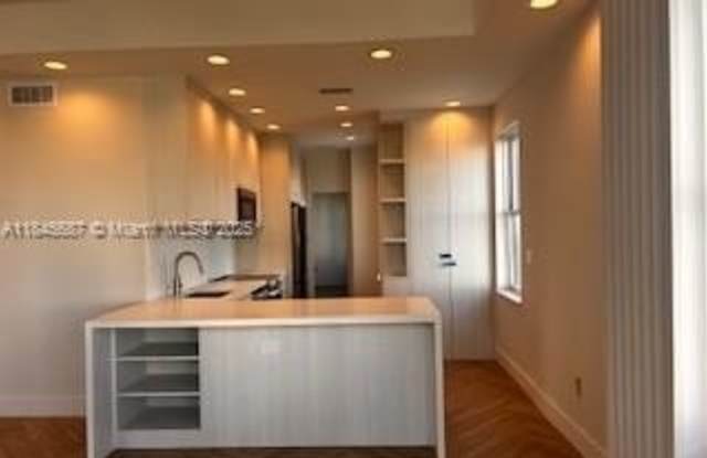 2421 LAKE PANCOAST DR