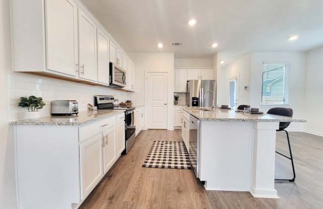 Spacious 4/BR 2.5/BA Retreat with Fenced Yard and Smart Features