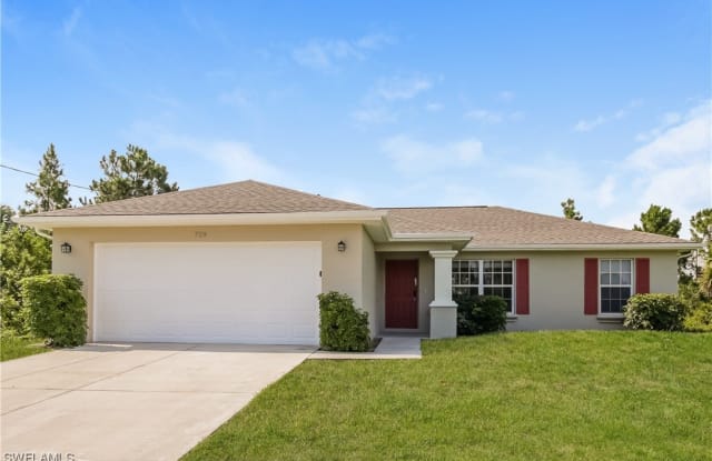 729 Alamo Street E - 729 Alamo Street East, Lehigh Acres, FL 33974