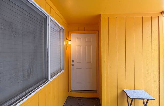 2bdrm, 1 bath lower level apartment close to parking and shopping with flexible month to month lease