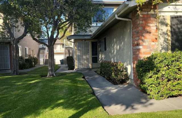 NICELY UPGRADED 2 STORY TOWNHOUSE WITH GARAGE  POOL
