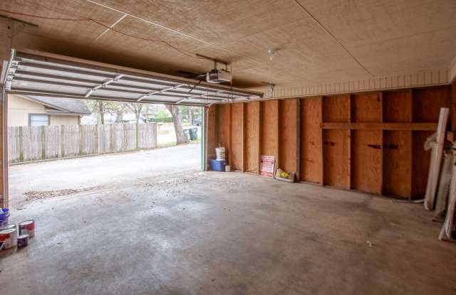 Eclectic 3 Bedroom, 2 Bathroom Home - 2 Car Garage - Fenced Yard and More!