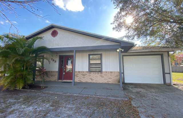 3/2 home with garage - tile on inside with screened rear porch!