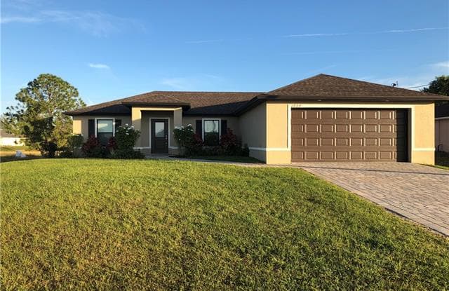 1727 NW 12TH TER - 1727 Northwest 12th Terrace, Cape Coral, FL 33993