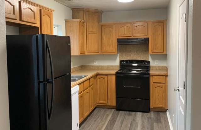 Super cute and updated with fresh paint, new floors, some fixtures, and all appliances.