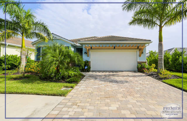 ***STUNNING 4 BEDROOM HEATED POOL HOME IN BONITA SPRINGS WITH AMAZING AMENITIES **** photos photos