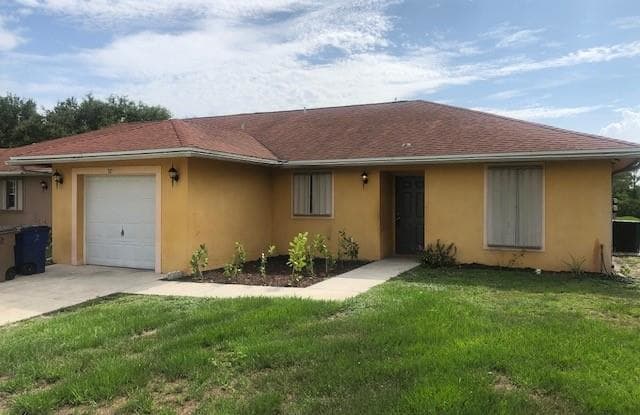 320 Harry AVE S - 320 320/322 Harry Ave S, Lehigh Acres, FL 33973