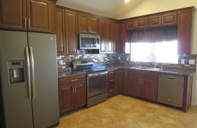 6917 W CHOLLA Street