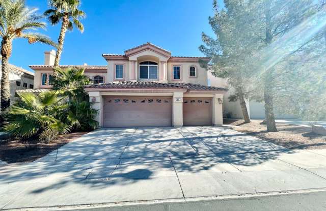 A gorgeous two story home with a grand entryway and a beautiful golf course view from the backyard within the Rhodes Ranch gated community. photos photos