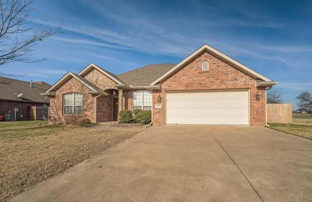 Welcome to this stunning 4-bedroom, 2-bathroom