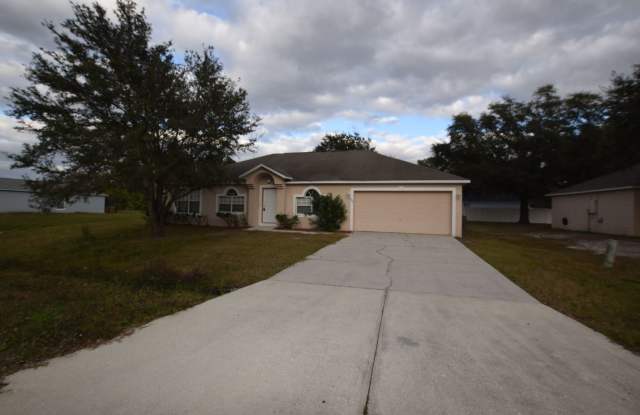 Beautiful 4 bedrooms/ 2 baths home with a 2 car garage for rent at 826 Halifax Dr. Kissimmee, FL 34758. - 826 Halifax Drive, Poinciana, FL 34758