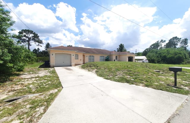 1412 E 12th St - 1412 E 12th St, Lehigh Acres, FL 33972