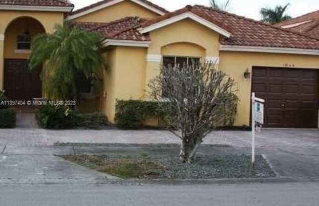 1044 NW 129th Ct