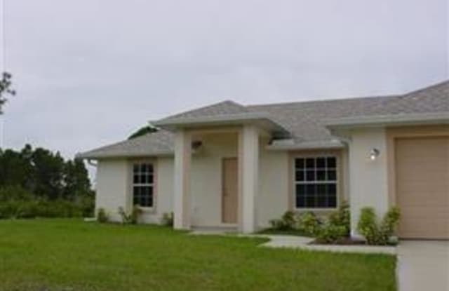 1403 W 15th ST - 1403 West 15th Street, Lehigh Acres, FL 33972