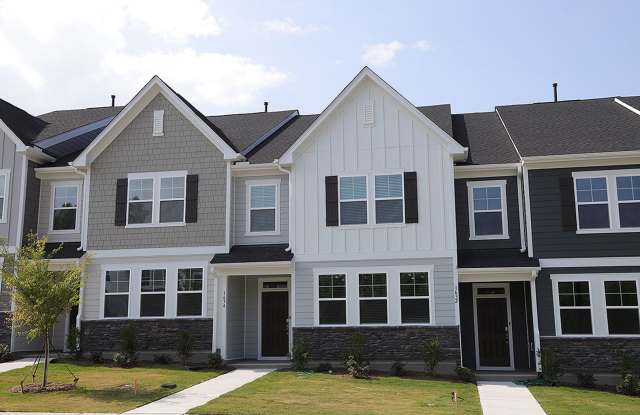 Photo of Beautiful 3 Bed+Bonus+2 Car Garage Townhome in New Wake Forest Community