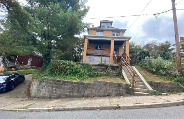 Updated 3-4 BR House with fenced yard & off street parking!