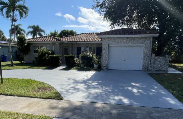 Renovated 3 bedroom, 2 bath, Single Family home with 1 car garage and fenced in back yard in Margate.