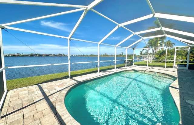 Beautiful Waterfront 3 Bed 2 Bath Home With Heated Pool, Washer/Dryer In Unit  More!