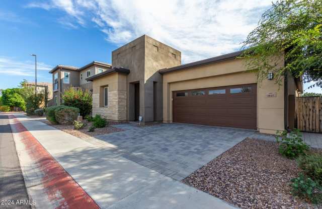 stunning Stunning 4 bedroom, 3 bathroom home nestled on one of the largest lots in the gated community of Rhythm!