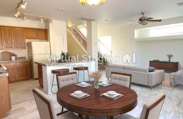 Gated Community! Fabulous 4 Bedrooms Plus Large Loft. One Bed and Bath Downstairs.