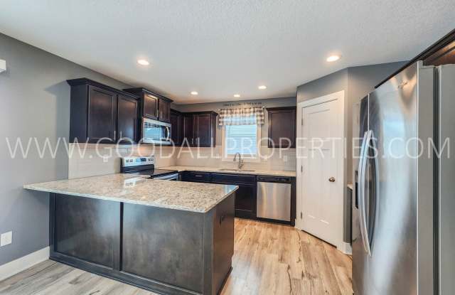 A Must See 4 Bedroom 3.5 Baths in Norwalk with a 3 Car Garage!!!