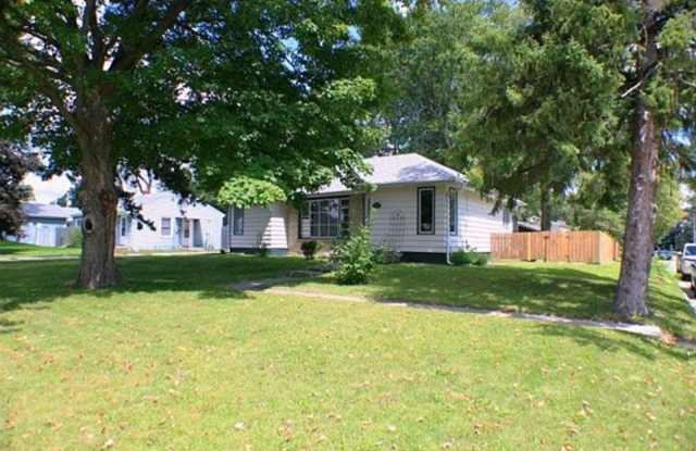 Corner Lot Charm: Spacious 3-Bed Home with Fireplace and Prime Location