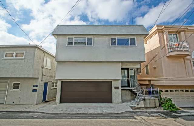 REMODELED, BRIGHT & AIRY, 2-STORY HOME W/ AMAZING PANORAMIC OCEAN VIEWS, 2 LIVING SPACES, 2 LARGE BALCONIES, 2-CAR GARAGE & LARGE BASEMENT!