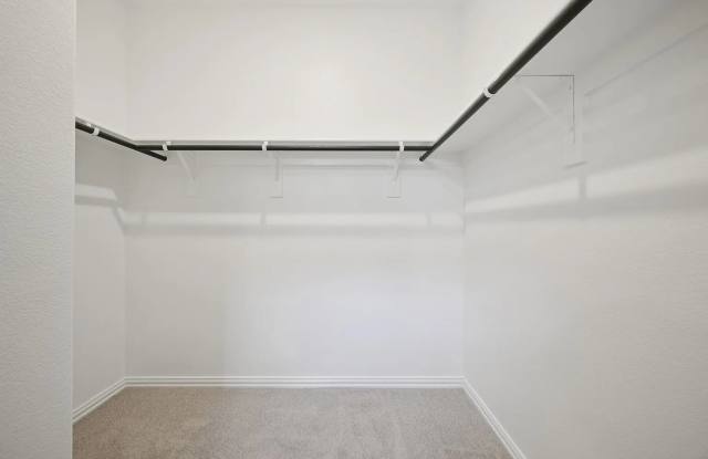 Stylish 3-bedroom home with modern kitchen, airy living spaces, vaulted primary suite, and elegant finishes throughout.