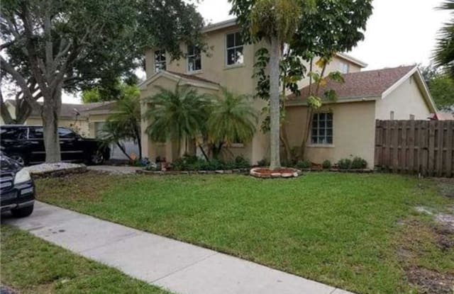 9558 Northwest 53rd Street - 9558 Northwest 53rd Street, Sunrise, FL 33351