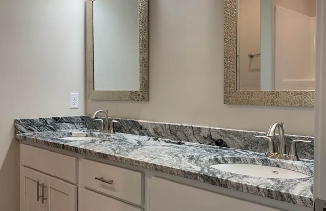 Zero entry ranch townhome with 2 stall garage. Spacious 2 bedrooms with walk in closets, 2.5 bathroom, 1st floor laundry