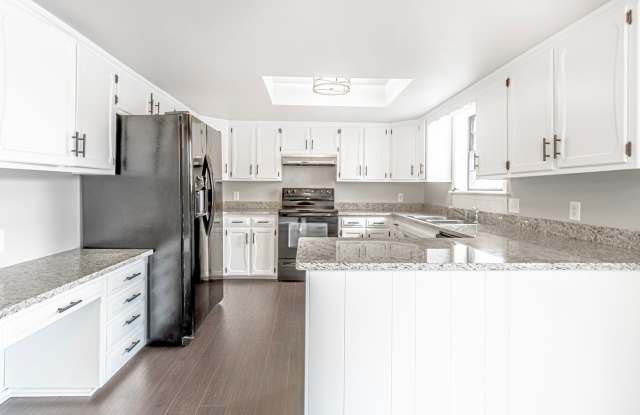 Beautiful home in an established neighborhood with a new roof is waiting for you!