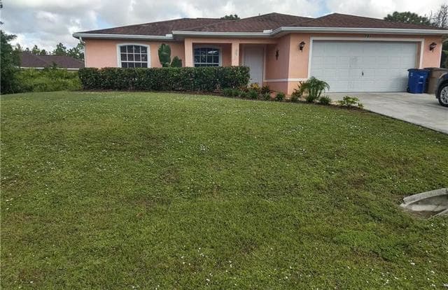 721 Little Rock ST E - 721 Little Rock Street, Lehigh Acres, FL 33974